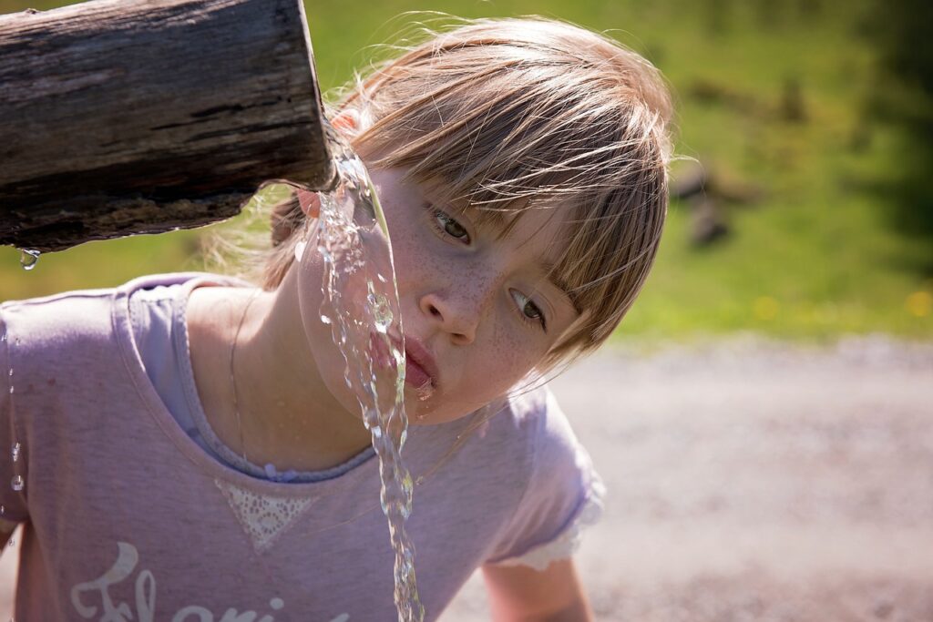 child drinking water