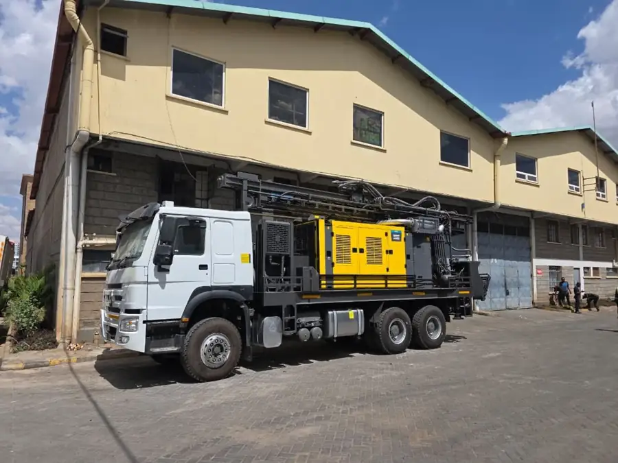 Truck mounted borehole drilling rig with compressor ready for mobilisation in Kenya